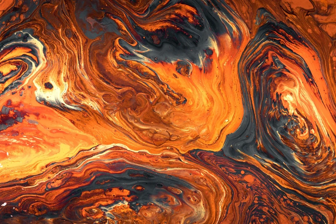 Textura abstracta en tonos naranja, negro y blanco